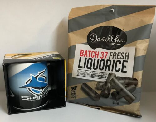 Gift Pack With Cronulla Sharks NRL Logo Coffee Mug + Darrell Lea Batch 37 Fresh Liquorice 260g in Gold Bag